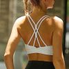 Strappy Sports Bra for Women Sexy Crisscross Back Light Support Yoga Bra with Removable Cups